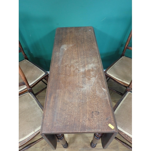 337 - A Victorian mahogany dropleaf Dining Table and four Chairs