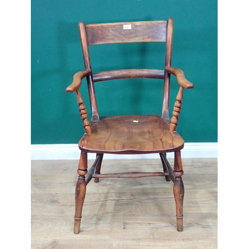 348 - An antique beech wood bar-back Elbow Chair