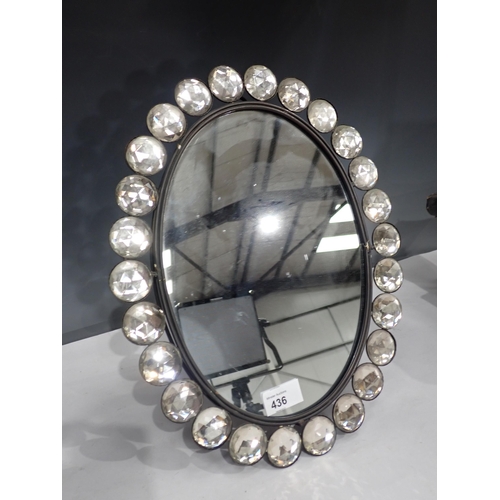 384 - An oval easel Dressing Mirror framed by cut crystal 15in x 12in