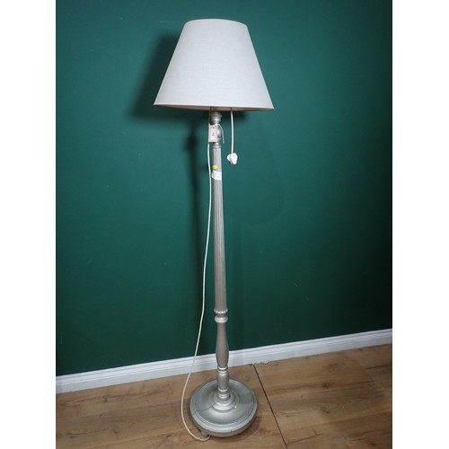 53 - A silver painted Standard Lamp ( passed PAT) and a quantity of shades