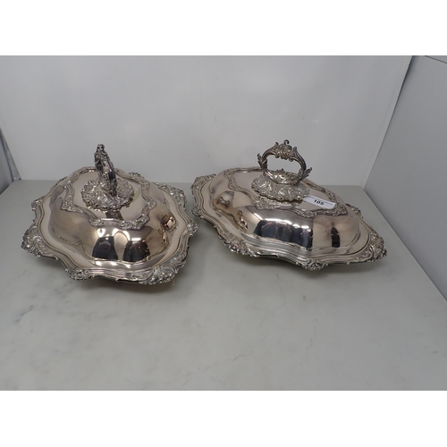 105 - A pair of Victorian silver plated shaped oval Entree Dishes and Covers with scroll friezes, 14 in