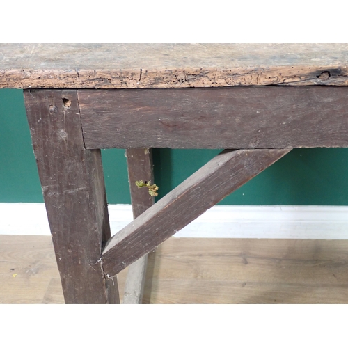 26 - An antique oak Farmhouse Table with plank top on square cut supports and end stretchers 4ft W x 2ft ... 