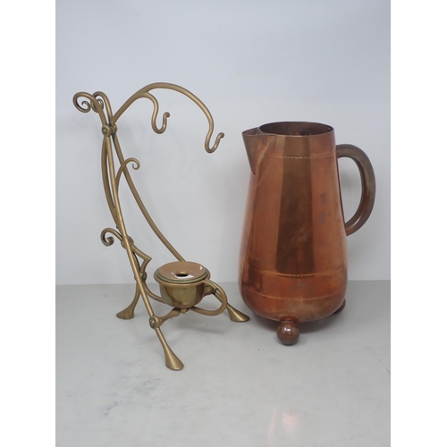 3 - An Arts and Crafts copper Jug mounted on three ball feet, stamped S. Smith, Covent Garden 11in H x 6... 