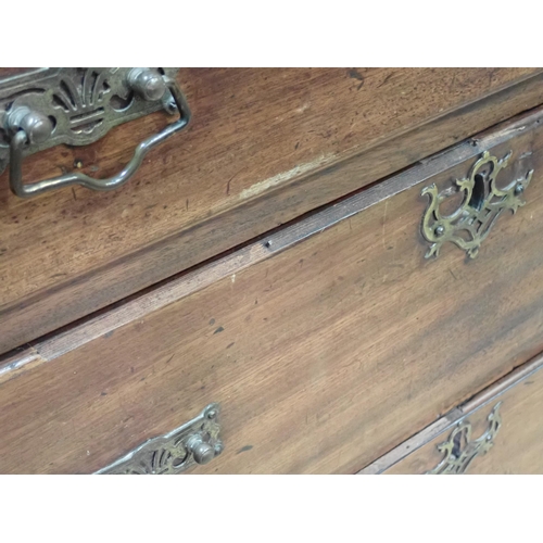 30 - A Georgian mahogany Chest of two short and four graduated long drawers mounted on ogee bracket feet ... 