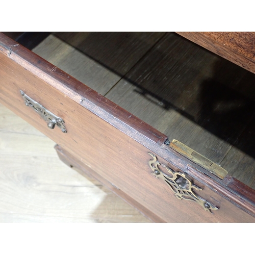 30 - A Georgian mahogany Chest of two short and four graduated long drawers mounted on ogee bracket feet ... 