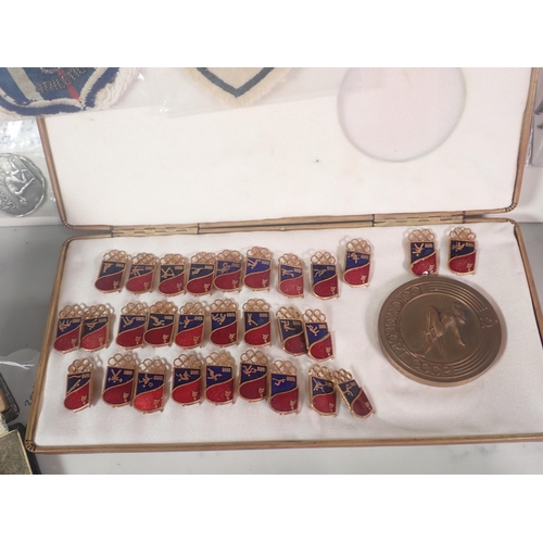 301 - A tray of sporting Medals and Badges, a plated Olympic Buckle, a silver Masonic Badge, etc.