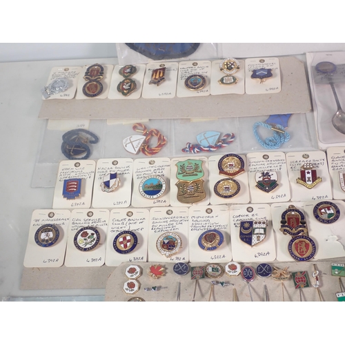 302 - Two trays of sporting Badges, Pins and Souvenir Spoons including Bowling, Lords Hockey, Shooting, et... 