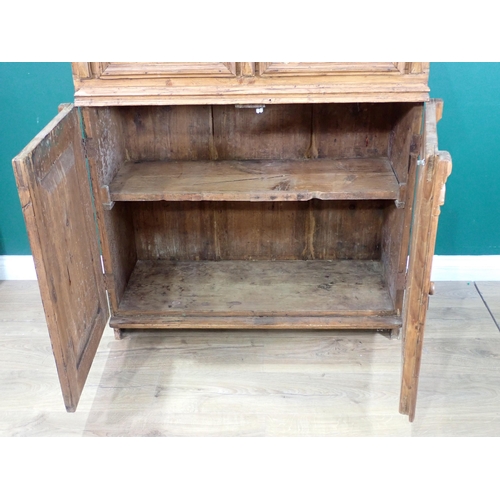 32 - A 19th Century Continental pine Cupboard fitted two frieze drawers above pair of doors 3ft 7in H x 3... 