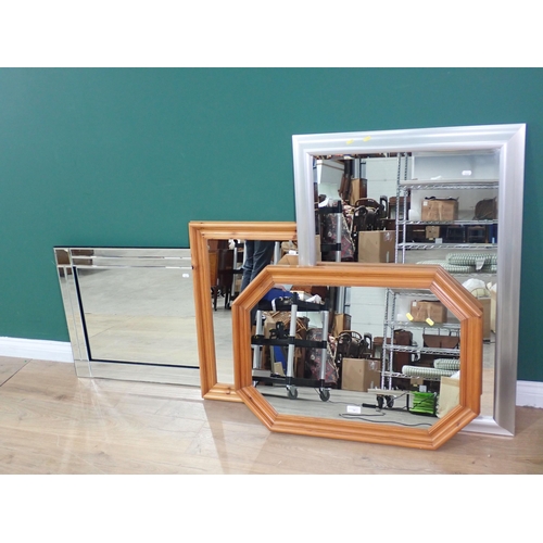 340 - Two modern pine framed Wall Mirrors, a silver painted framed Wall Mirror and another Mirror