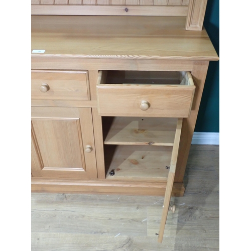 353 - A modern pine Dresser and Rack fitted three frieze drawers and three cupboard doors 6ft 6in H x 4ft ... 