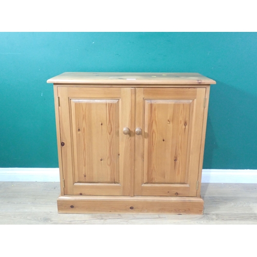 356 - A modern pine two door Cupboard 2ft 10in W x 2ft 7in H