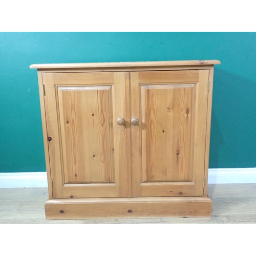 356 - A modern pine two door Cupboard 2ft 10in W x 2ft 7in H