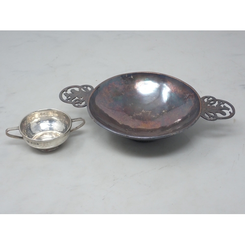 4 - An Arts and Craft white metal Quaich with pierced handles with squirrels 9in D and a hammered silver... 