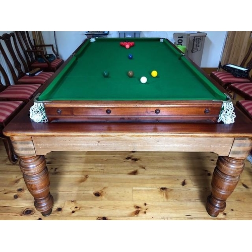 42 - A mahogany half size Snooker Table with flip top to form a Dining Table mounted on turned supports 8... 