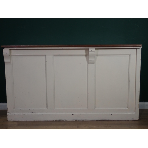 505 - An antique white painted Shop Counter with mahogany top, panelled front, fitted with four drawers an... 