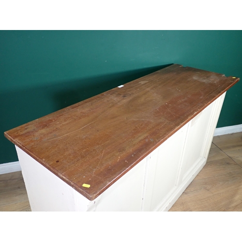 505 - An antique white painted Shop Counter with mahogany top, panelled front, fitted with four drawers an... 