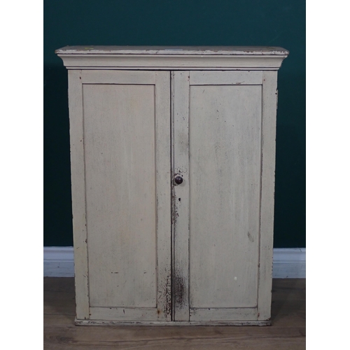 507 - A white painted pine Wall Cupboard fitted with two drawers and shelves, 2ft 7