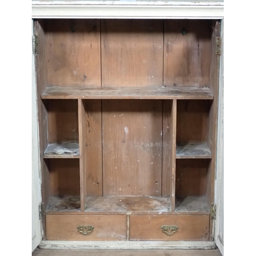 507 - A white painted pine Wall Cupboard fitted with two drawers and shelves, 2ft 7