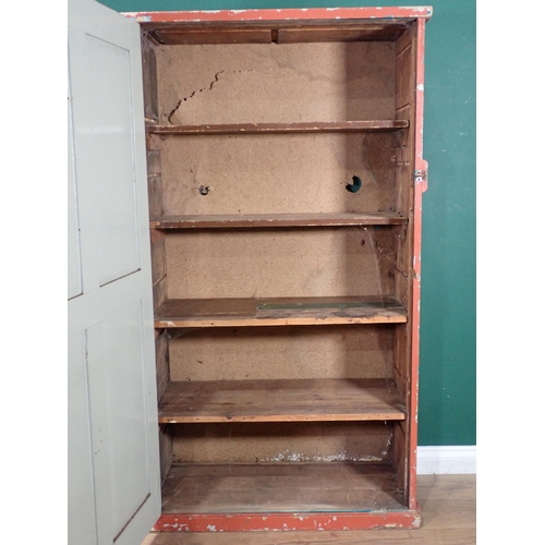 508 - A red painted pine Cupboard with panelled door, fitted four shelves. 5ft H x 2ft 11