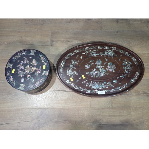 510 - An antique Chinese rosewood and mother of pearl inlaid circular Box with designs of butterflies and ... 