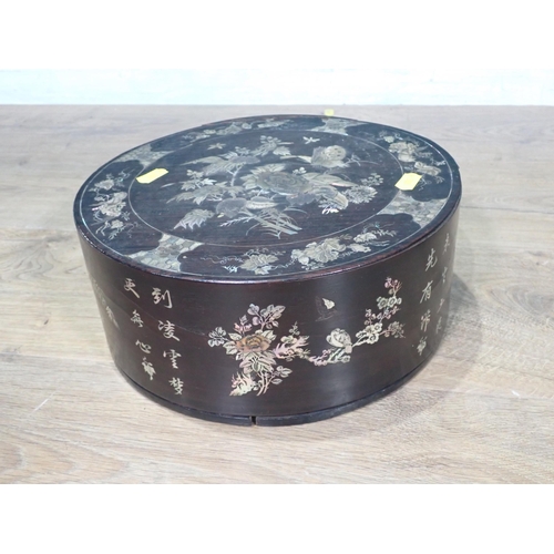 510 - An antique Chinese rosewood and mother of pearl inlaid circular Box with designs of butterflies and ... 