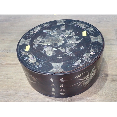 510 - An antique Chinese rosewood and mother of pearl inlaid circular Box with designs of butterflies and ... 