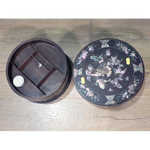 510 - An antique Chinese rosewood and mother of pearl inlaid circular Box with designs of butterflies and ... 