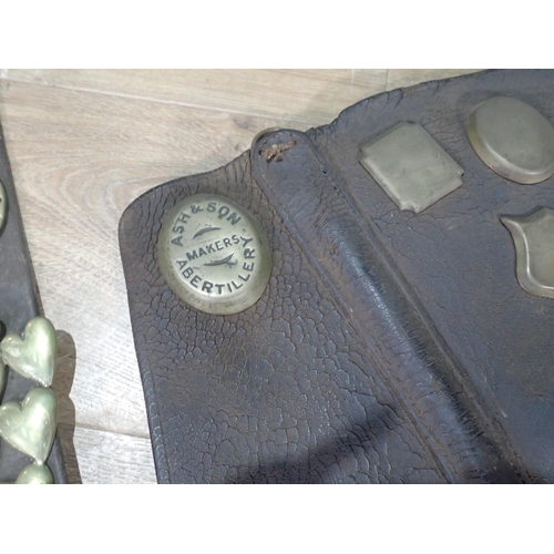 513 - A leather Breast Plate and two leathers with Horse Brasses