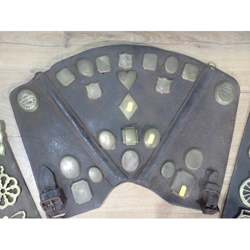 513 - A leather Breast Plate and two leathers with Horse Brasses