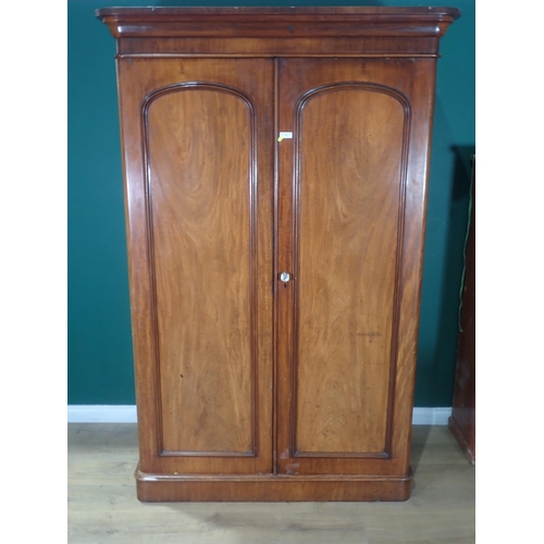 521 - A Victorian mahogany Wardrobe fitted pair of cupboard doors enclosing four drawers 6ft 10in H x 4ft ... 