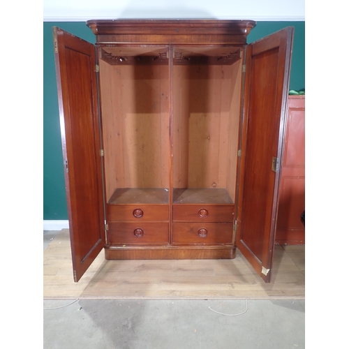 521 - A Victorian mahogany Wardrobe fitted pair of cupboard doors enclosing four drawers 6ft 10in H x 4ft ... 