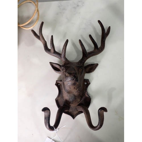 58 - A metal Coat Hook in the form of a Red Deer, a three branch Candle Holder and a Figural Table Lamp, ... 