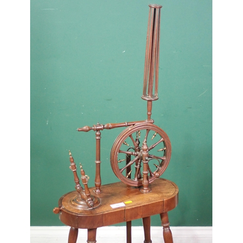 82 - A 19th Century mahogany Spinning Wheel on turned supports 4ft 1in H x 1ft 6in W