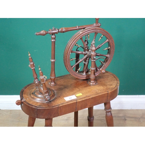 82 - A 19th Century mahogany Spinning Wheel on turned supports 4ft 1in H x 1ft 6in W