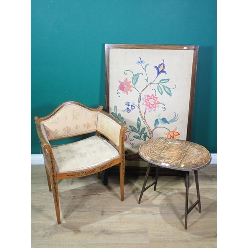 84 - A satinwood Piano Chair with floral painted decoration, an oak Occasional Table and a needlework Scr... 