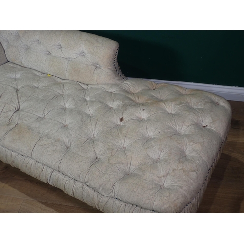 86 - A 19th Century Chaise Lounge with white floral button upholstery mounted upon beech turned supports ... 