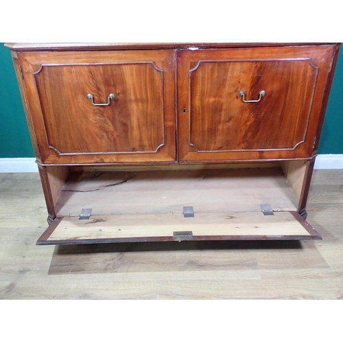 88 - A mahogany Cupboard fitted two doors above fall front A/F 4ft 6in W x 3ft 2in H