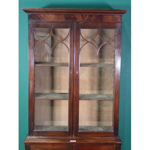 90 - A 19th Century mahogany Bookcase fitted pair of glazed doors enclosing adjustable shelves above pair... 