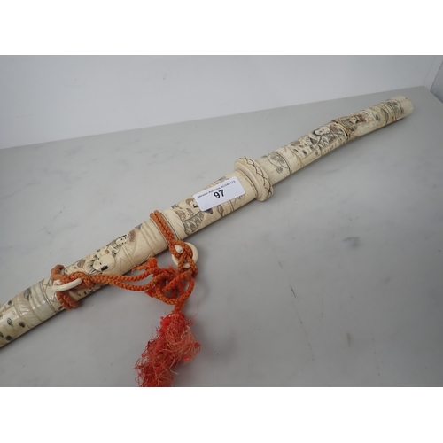 97 - A Japanese souvenir Katana in a carved bone scabbard with figures, 30 in L A/F