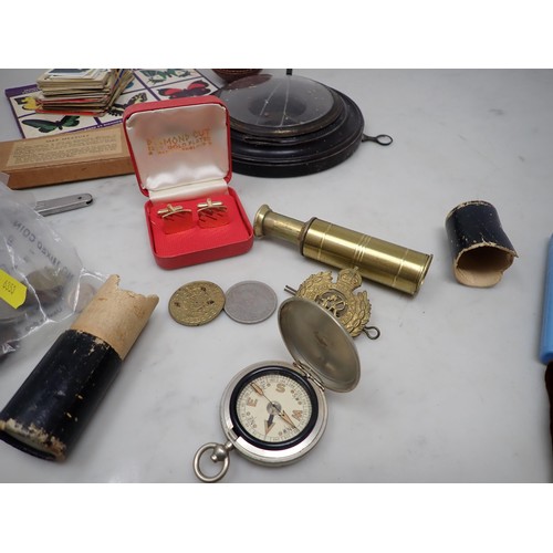 150 - A small brass pocket Telescope, silver Wristwatch, A/F, O'Brien Pound Note, Ten Shilling Note, circu... 