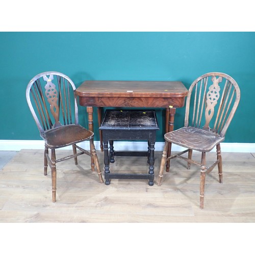 520 - A 19th Century mahogany fold over Card Table on later turned supports, four wheelback Kitchen Chairs... 