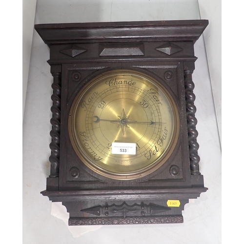 259 - An oak cased Barometer with brass dial by W.G. Whiting, Manchester 1ft 4in x 1ft 2in