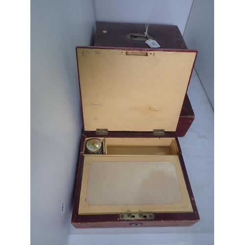 132 - Two antique leather covered Writing Boxes and a red Box with Coat of Arms