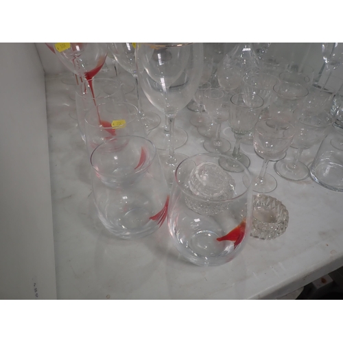 133 - A collection of Glassware including two Decanters, Vases, Wine Glasses, etc.