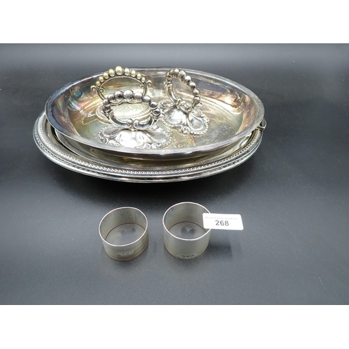 268 - Two silver Napkin Rings, London 1920 and Sheffield 1954, four plated oval Dishes and three handles