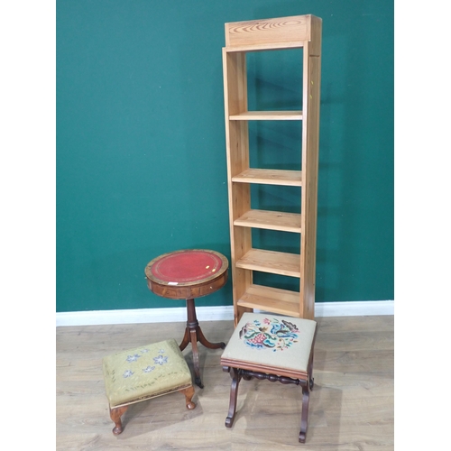 539 - A modern pine narrow Bookcase, a reproduction mahogany Drum Table, and two upholstered Stools A/F.