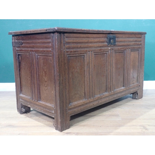 289 - A 17th Century oak Coffer with five panel sunken lid above four panel front mounted on double channe... 