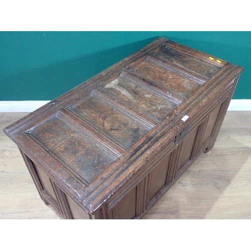 289 - A 17th Century oak Coffer with five panel sunken lid above four panel front mounted on double channe... 