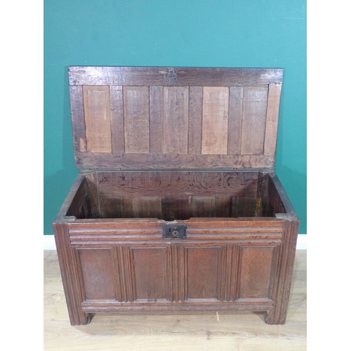 289 - A 17th Century oak Coffer with five panel sunken lid above four panel front mounted on double channe... 