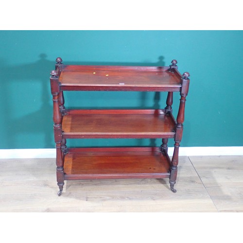 284 - A 19th Century mahogany three tier Buffet on baluster turned supports 3ft 8in H x 3ft 4in W